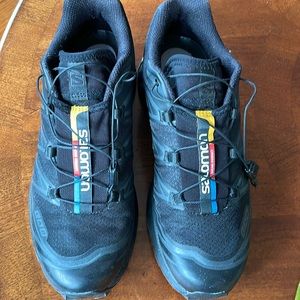 Salomon shoes women size 9. Men size 8. Worn twice.
